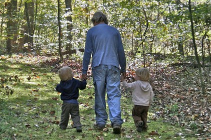 Caleb and James Little with their grandfather Joe Little, on the mossy paths about 2012